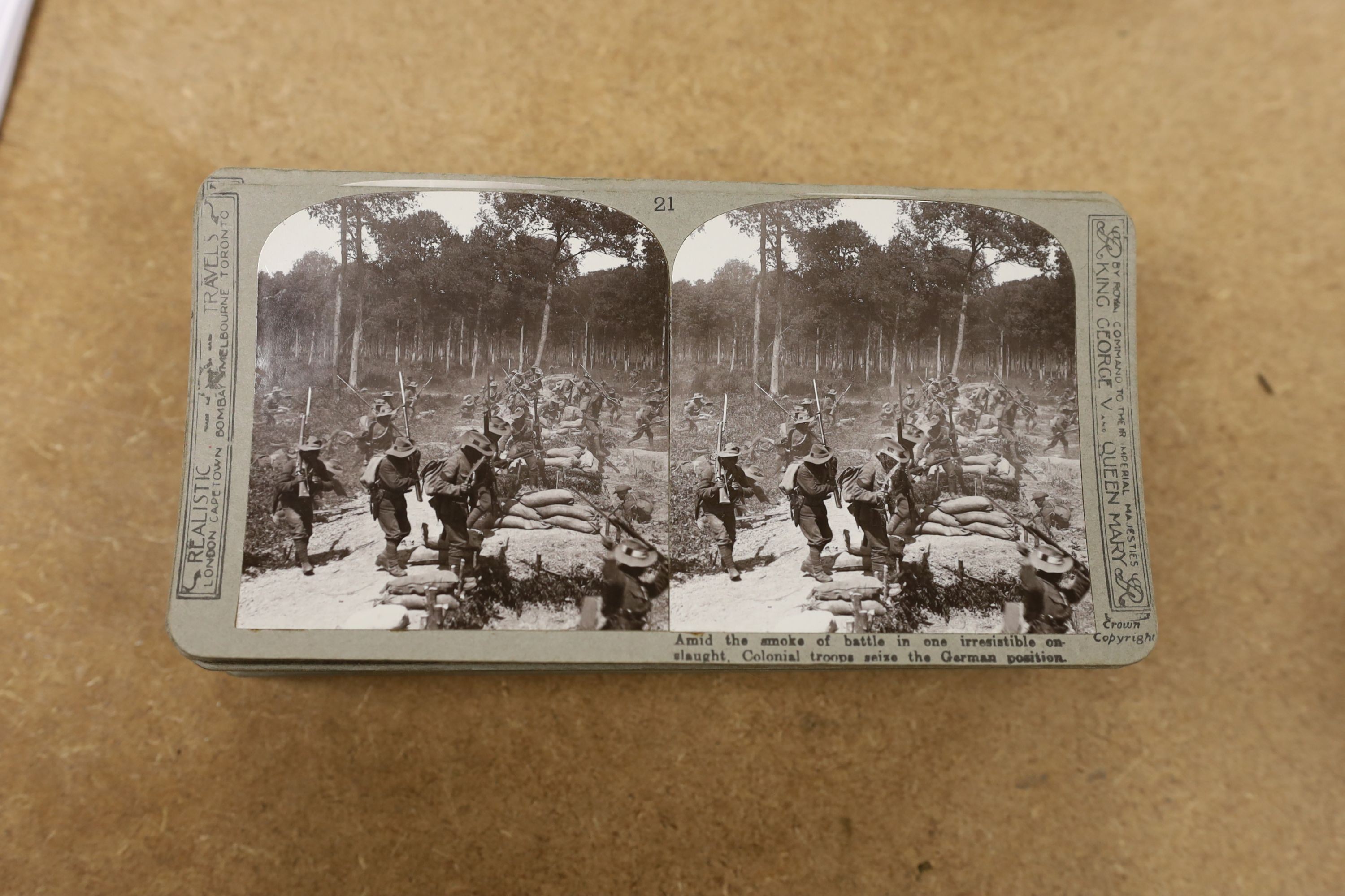 A set of The Great War stereoscopic slides, in case, and a viewer, 31 cms long.